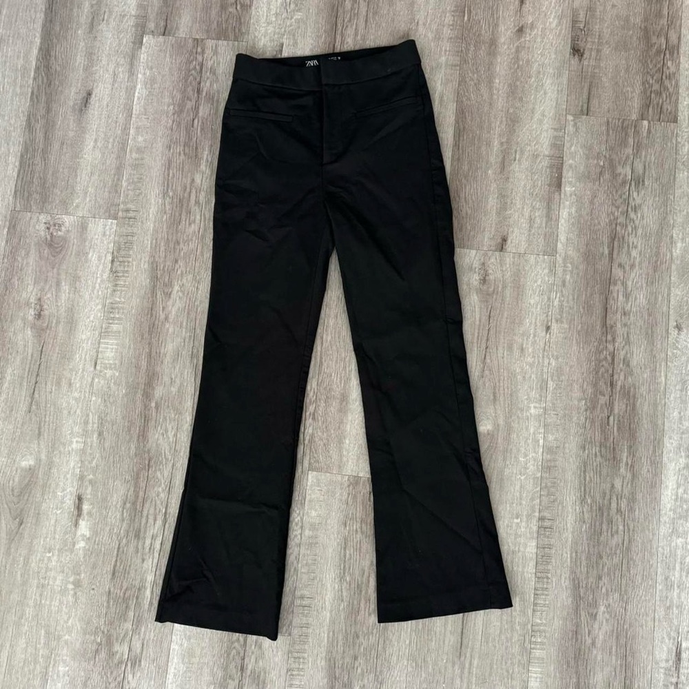 Black flared trousers from Zara Spain